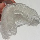 Illustration for article titled A Crazy 3D-Printed Mouthpiece That Brushes Your Teeth For You